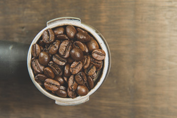 Coffee beans in the coffee tablet. Stil life style and Vintage.