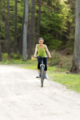Naklejka premium Female tourist with bicycle