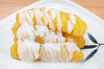 Banana syrup with coconut milk (Thai dessert).