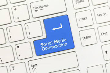 White conceptual keyboard - Social Media Optimization (blue key)