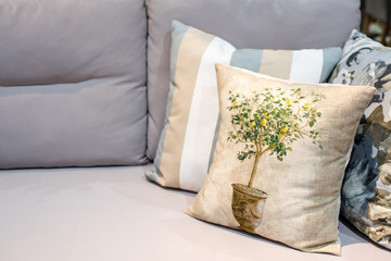 Pillows on Grey Sofa