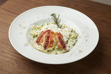 pasta with cheese and fried bacon