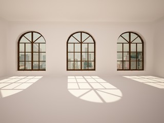 Large, empty, bright room with big arc windows