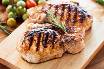 grilled pork chop with rosemary leaf