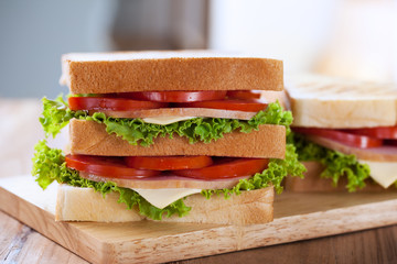 sandwiches on wooden board for breakfast