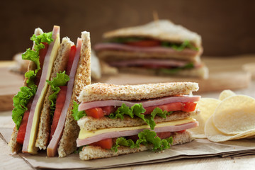 homemade club sandwich with potato chip