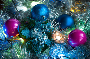 Christmas background with lights, tinsel, and Christmas balls