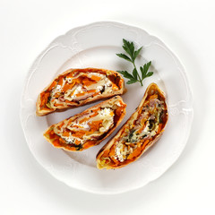 Pumpkin strudel with ham and goat cheese