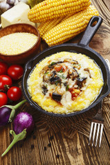 Polenta baked with vegetables and cheese