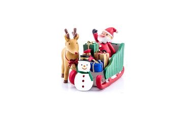 Santa claus in sleigh carrying a gifts with reindeer and snowman