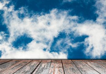 Naklejka na ściany i meble blue sky and clouds with wooden paving