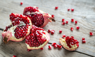 Pomegranate on the wooden background