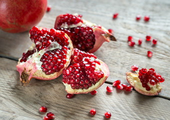 Pomegranate on the wooden background