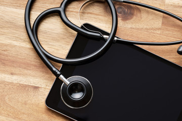 stethoscope and computer tablet