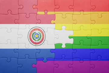 puzzle with the national flag of paraguay and gay flag