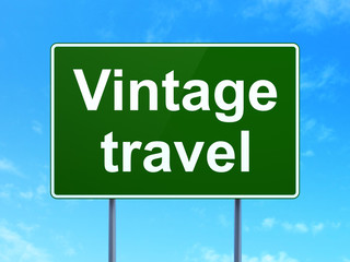 Travel concept: Vintage Travel on road sign background