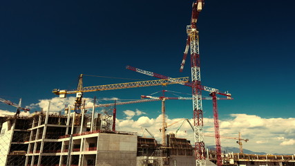 big construction site with cranes panorama timelapse tracking linear motion