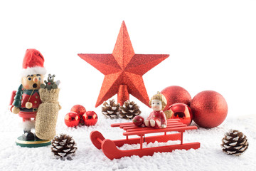 Weihnachtsdekoration, Stern, Schlitten, Kugeln und mehr