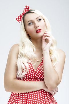 Style Concept. Young Caucasian Blond Female Posing in Pinup Style