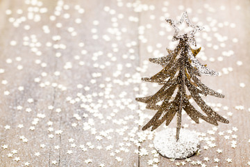 Christmas decoration with fir branches on the wood background.