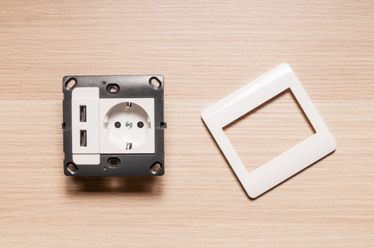 The socket with two usb-charger ports, without decorating pane.