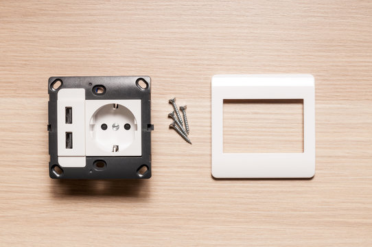 The socket with two usb-charger ports, without decorating pane.