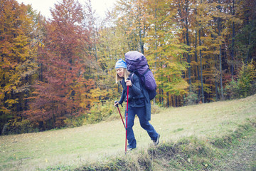 Obraz premium Girl walking in the forest.