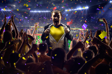 Fans on stadium game businessman