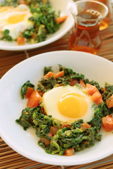 Fried eggs with spinach