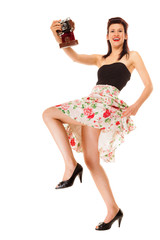  Girl taking self portrait from vintage camera.