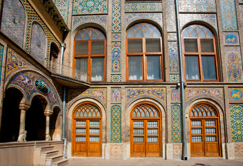 Tiled walls with Persian patterns of the royal palace Golestan in Iran