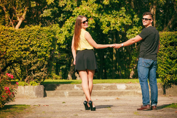 Obraz premium Walking couple back view