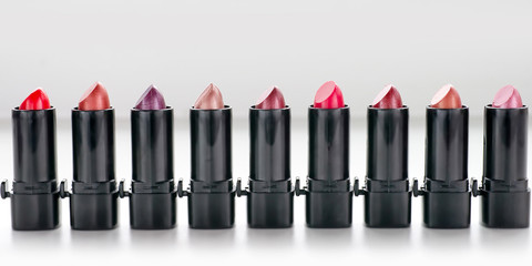 Row of red lipsticks