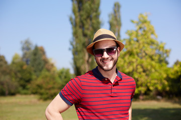 Young hipster man wearing hat