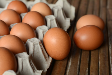 Eggs in trays made of paper.
