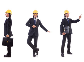Young architect wearing hardhat on white
