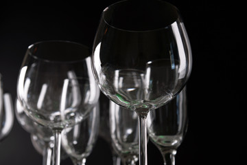 Empty wine glasses on dark background