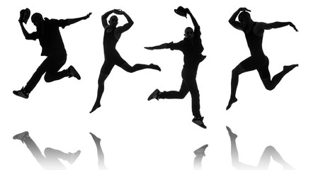 Silhouettes of dancers in dancing concept