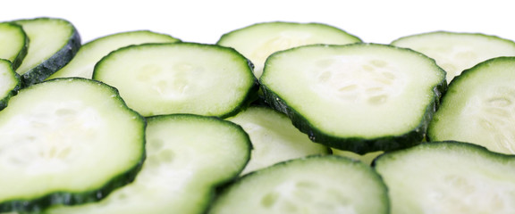 Sliced cucumbers isolated on white