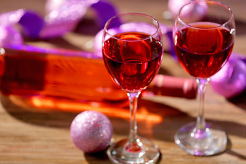Wine and Christmas decoration on bright background
