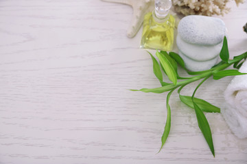 Beautiful composition of spa treatment on wooden table