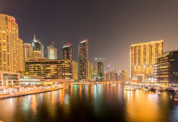 Fototapeta na wymiar Dubai - AUGUST 9, 2014: Dubai Marina district on August 9 in UAE. Dubai is fastly developing city in Middle East