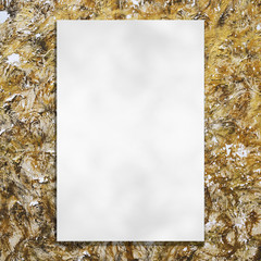 Blank white paper on grunge wall