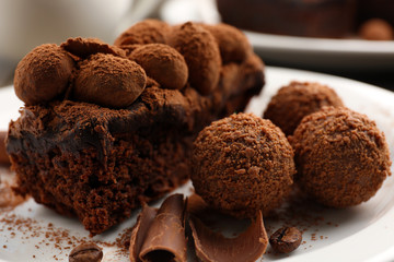 A piece of chocolate cake balls on the table, close-up