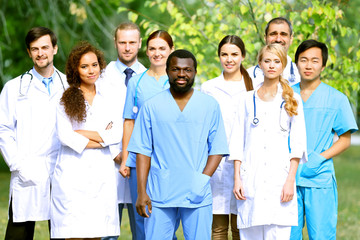 Smiling medics team, outdoors