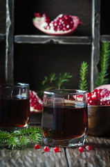 Pomegranate juice on the vintage table