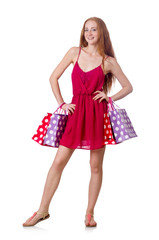 Woman with shopping bags isolated on white