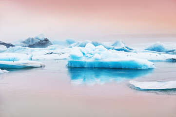 Blue icebergs in Jokulsarlon glacial lagoon