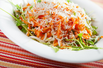 Fresh salad with carrots and cheese