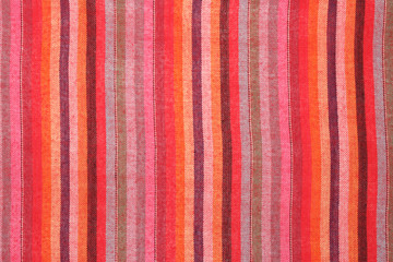 Fototapeta premium Striped colorful shawl as background texture